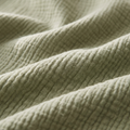 Close-up of the Solvrly Cloud Gauze Coverlet crinkled cotton gauze weave