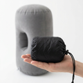 The Solvrly Cloud Rest inflatable travel pillow packs down into a pouch the size of a water bottle