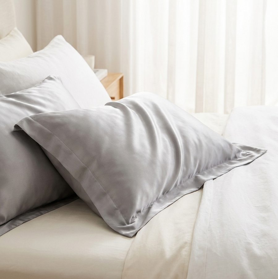 Silver grey cooling silk pillowcase set of 2 on white bedding