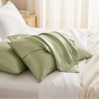 Sage green cooling silk pillowcase set of 2 on white bedding