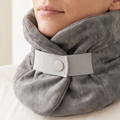 Close-up of the Solvrly Wrap Travel Pillow support strap cradling the chin